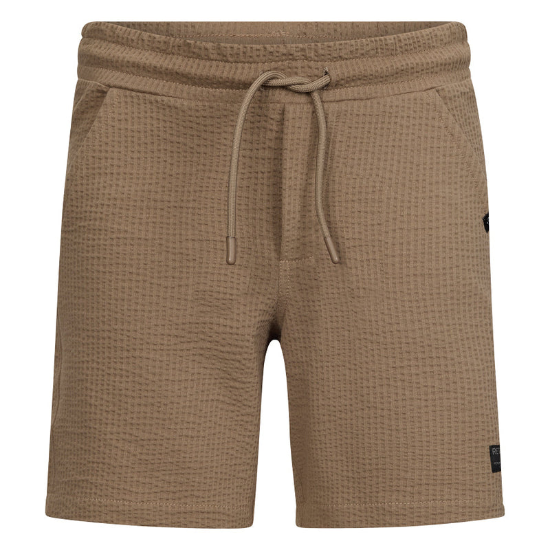 Jongens Sweat shorts Jones van RETOUR in de kleur camel in maat 182-188.