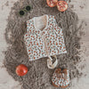 Unisexs Pommegranate | Floating Vest van Salted Stories in de kleur White Swan in maat 98-104.