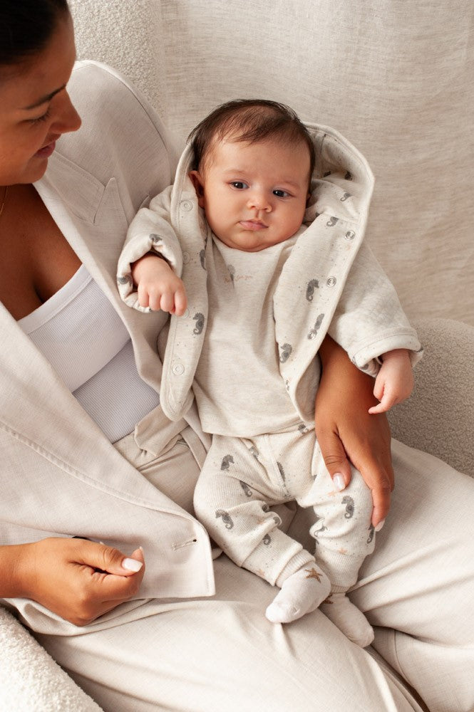 Unisexs Omkeerbaar jasje met capuchon AOP - Sea Sweeties van Feetje in de kleur Offwhite melange in maat 62.