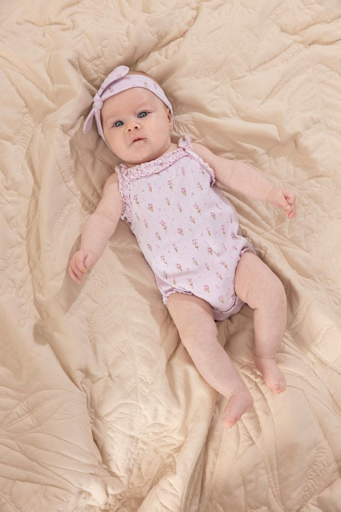 Meisjes Romper pointelle rib AOP - Flower Ranch van Feetje in de kleur Lila in maat 86.