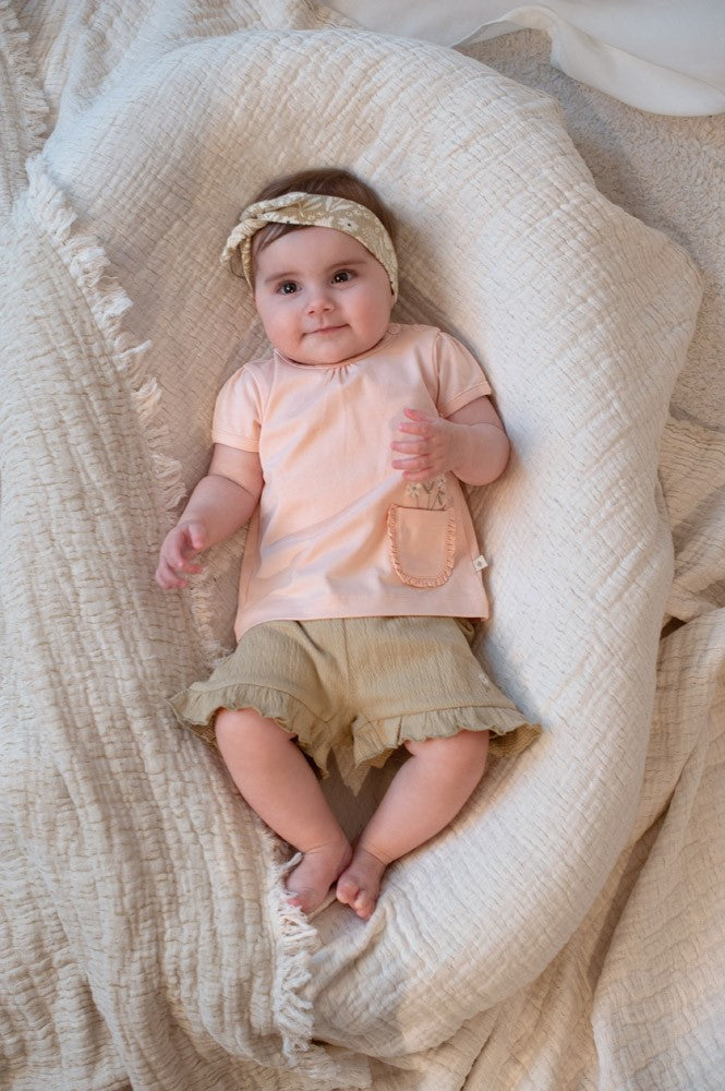 Meisjes T-shirt - Let Your Dreams Blossom van Feetje in de kleur Perzik in maat 86.