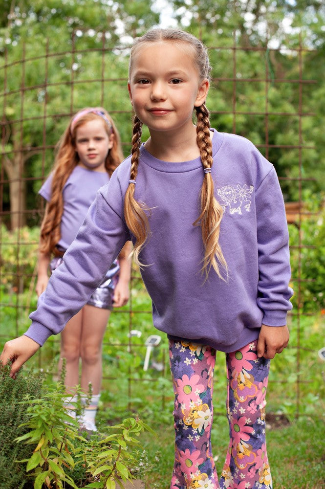 Meisjes Sweater met backprint - Rolling into Spring van Jubel in de kleur Paars in maat 128.