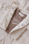 Unisexs Omkeerbaar teddy jasje met capuchon - Sleepy Sheepy van Feetje in de kleur Off White in maat 62.