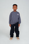 Jongens Sweater met backprint oversized - Rock the Earth van Sturdy in de kleur Blauw in maat 128.