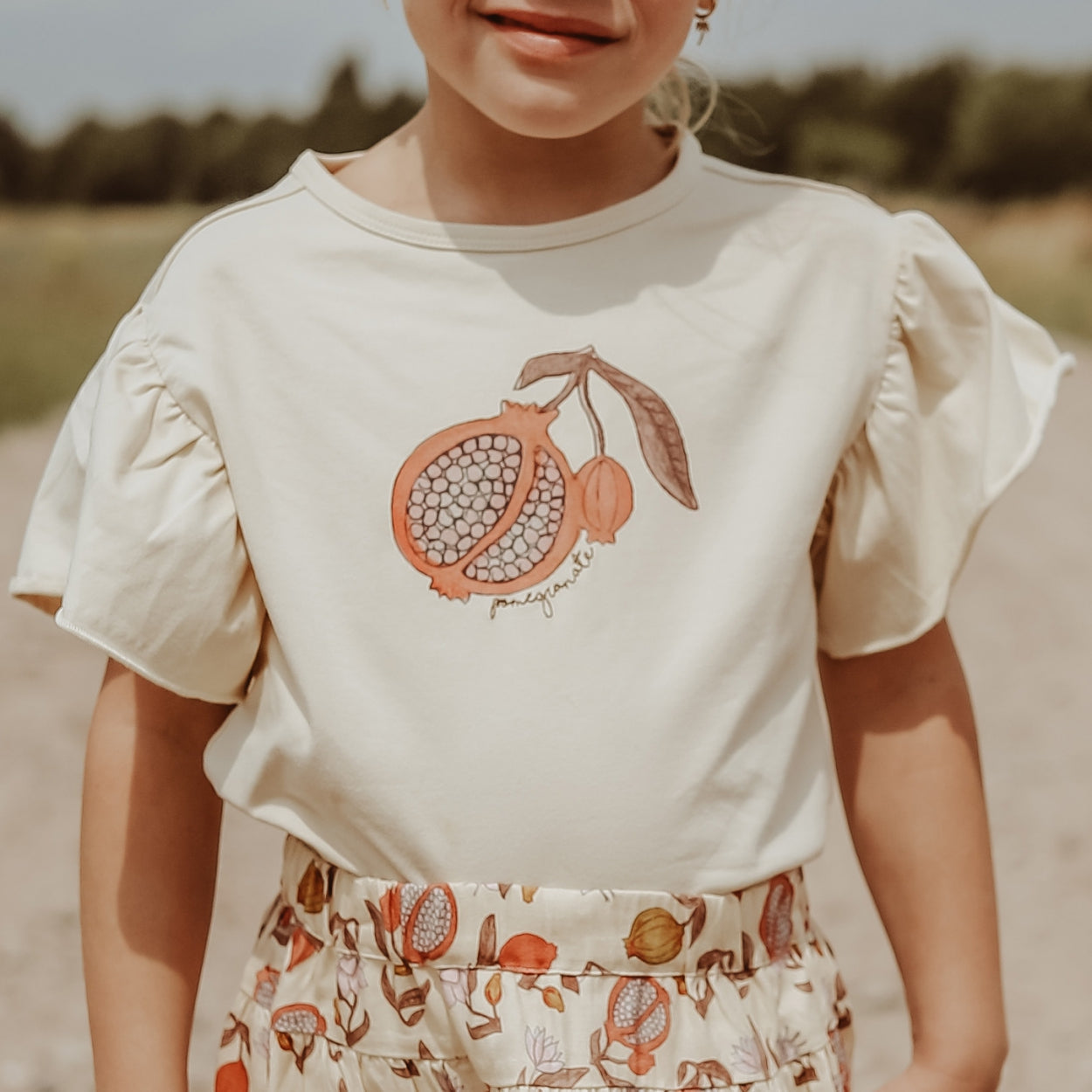 Meisjes T-Shirt Pomegranate | Jazz van Your Wishes in de kleur Honeycomb in maat 128.