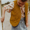 Meisjes Gilet Muslin | Poppy van Your Wishes in de kleur Saffron in maat 128.