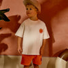 Jongens Garment Dye Shorts Tony van Z8 Mini in de kleur Sizzling orange in maat 116.