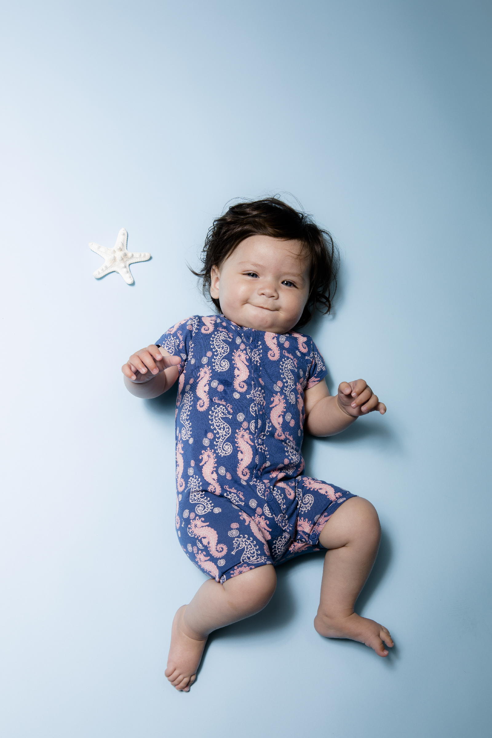 Meisjes Baby jumpsuit short sleeve van Charlie Choe in de kleur Mid blue & aop in maat 86.