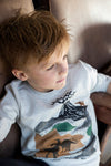 Jongens Sweater - He Ho Dino van Sturdy in de kleur Offwhite melange in maat 128.
