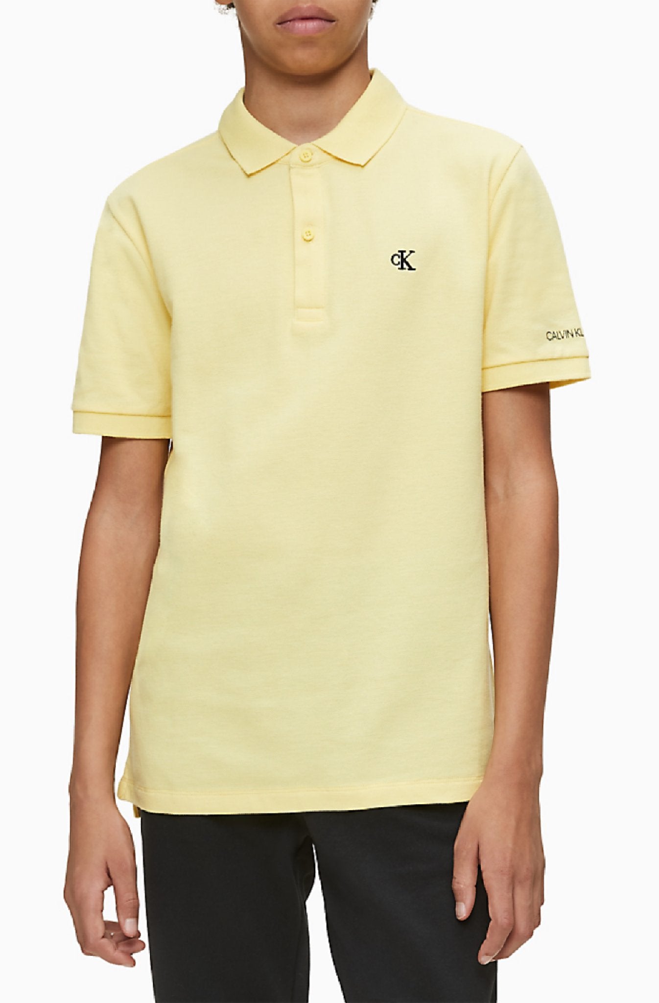 Jongens Essential Ss Polo van Calvin Klein in de kleur Geel in maat 176.