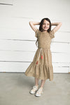 Meisjes Flo girls AO woven smock maxi dress van Like Flo in de kleur Panther in maat 152.