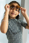 Meisjes Fancy Rib Aop Ruffle Dress van Like Flo in de kleur Navy in maat 140.