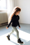 Meisjes Longsleeve van Little Levv in de kleur Black in maat 116.