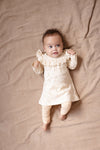 Meisjes Dress FANNY van Levv Newborn in de kleur AOP Peach Flowers in maat 68.