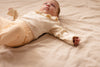 Meisjes Romper FENNA van Levv Newborn in de kleur AOP Peach Flowers in maat 68.