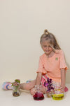 Meisjes Kapi rib jersey tshirt half sleeve with smock at shoulder van NoNo in de kleur Light Peach in maat 134-140.