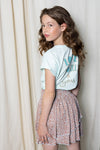 Meisjes Nada short layered skirt with short lining van NoBell in de kleur Spa Blue in maat 170-176.