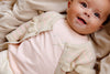 Meisjes Cardigan Sari van Quapi Newborn in de kleur Kit in maat 68.