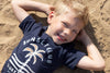 Jongens T-shirt Sunset Club - Indigo Island van Sturdy in de kleur Marine in maat 128.