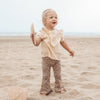 Meisjes Broek Flore Tan | Nikita van Your Wishes in de kleur Indian Tan in maat 92.