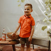 Jongens Polo Elton | Pique van Your Wishes in de kleur Flame in maat 98.