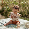 Meisjes Romper Papajas | Amy van Your Wishes in de kleur Apricot Brandy in maat 68.
