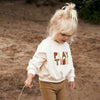 Meisjes Sweater Play Time | Nio van Your Wishes in de kleur Ivory in maat 92.